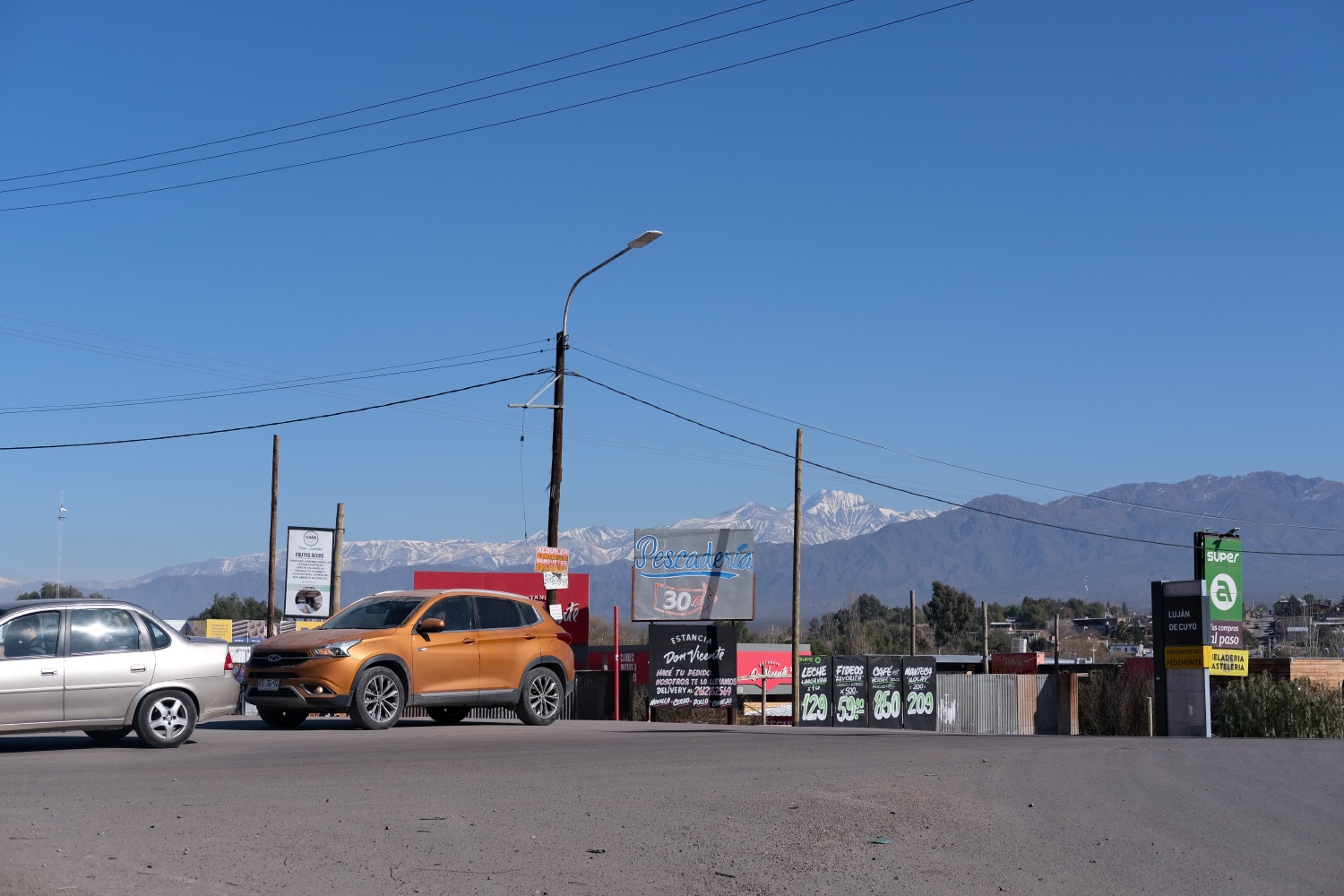 Mendoza is surrounded by mountain ranges on one side