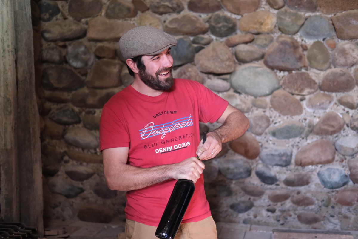 He opened an oak aged wine bottle just for us!