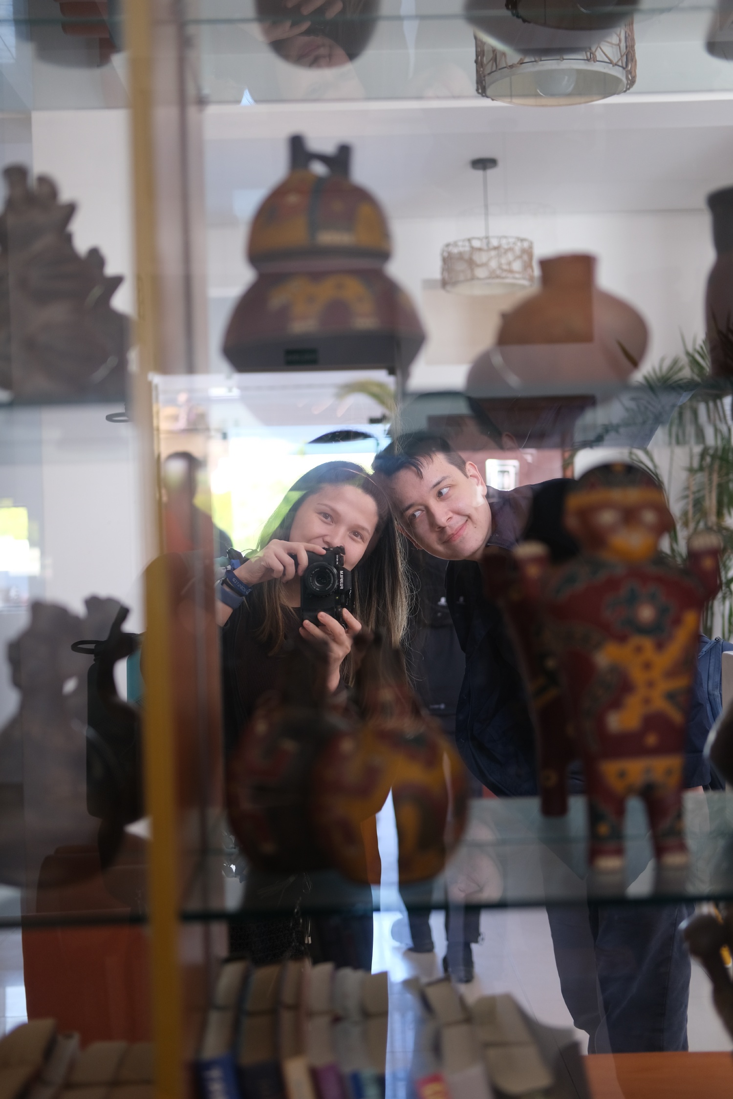 Taking a silly photo at our first stop! In the photo are samples of the amazing relics that Peru has a lot of! So preserved!
