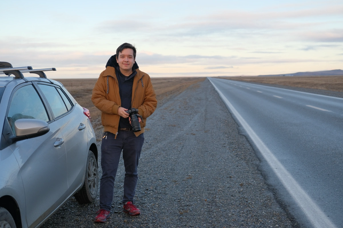 Empty roads, cold weather, happy couple taking photos