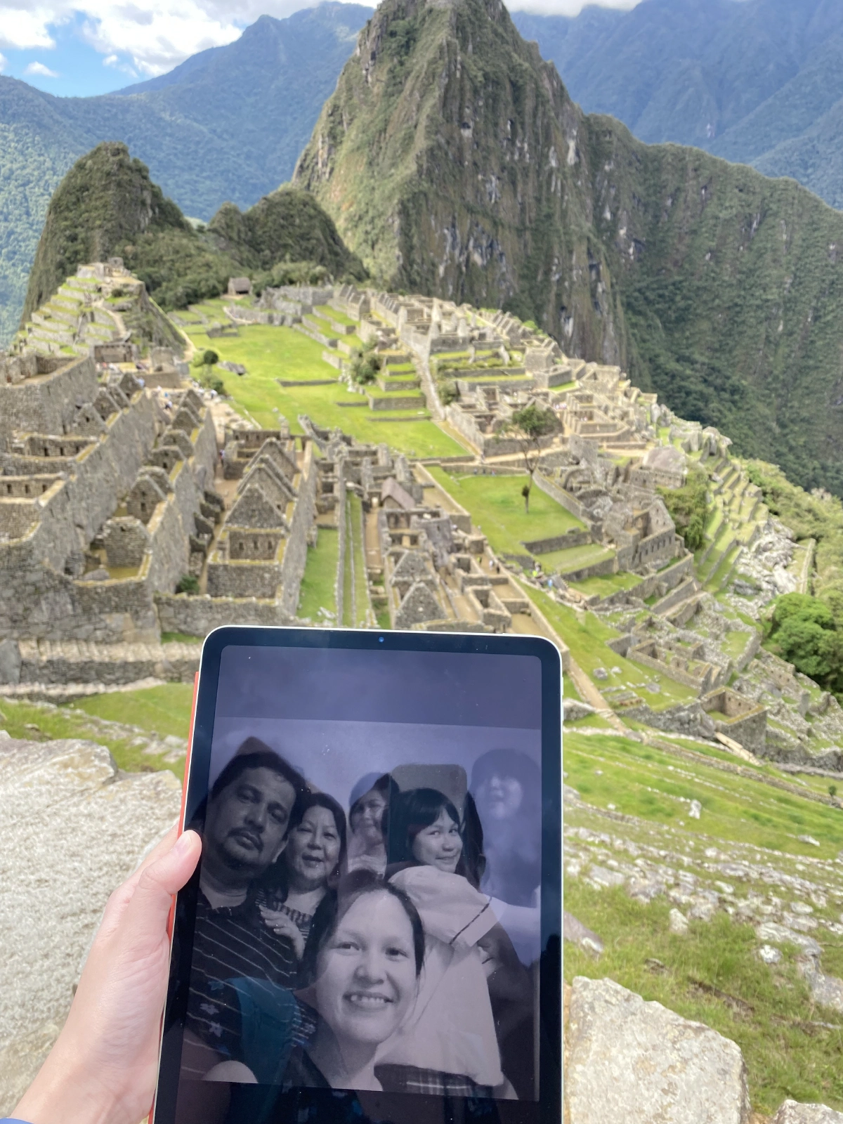 I was missing my family so I had the brilliant idea of taking our fam photo in the photos we travel to