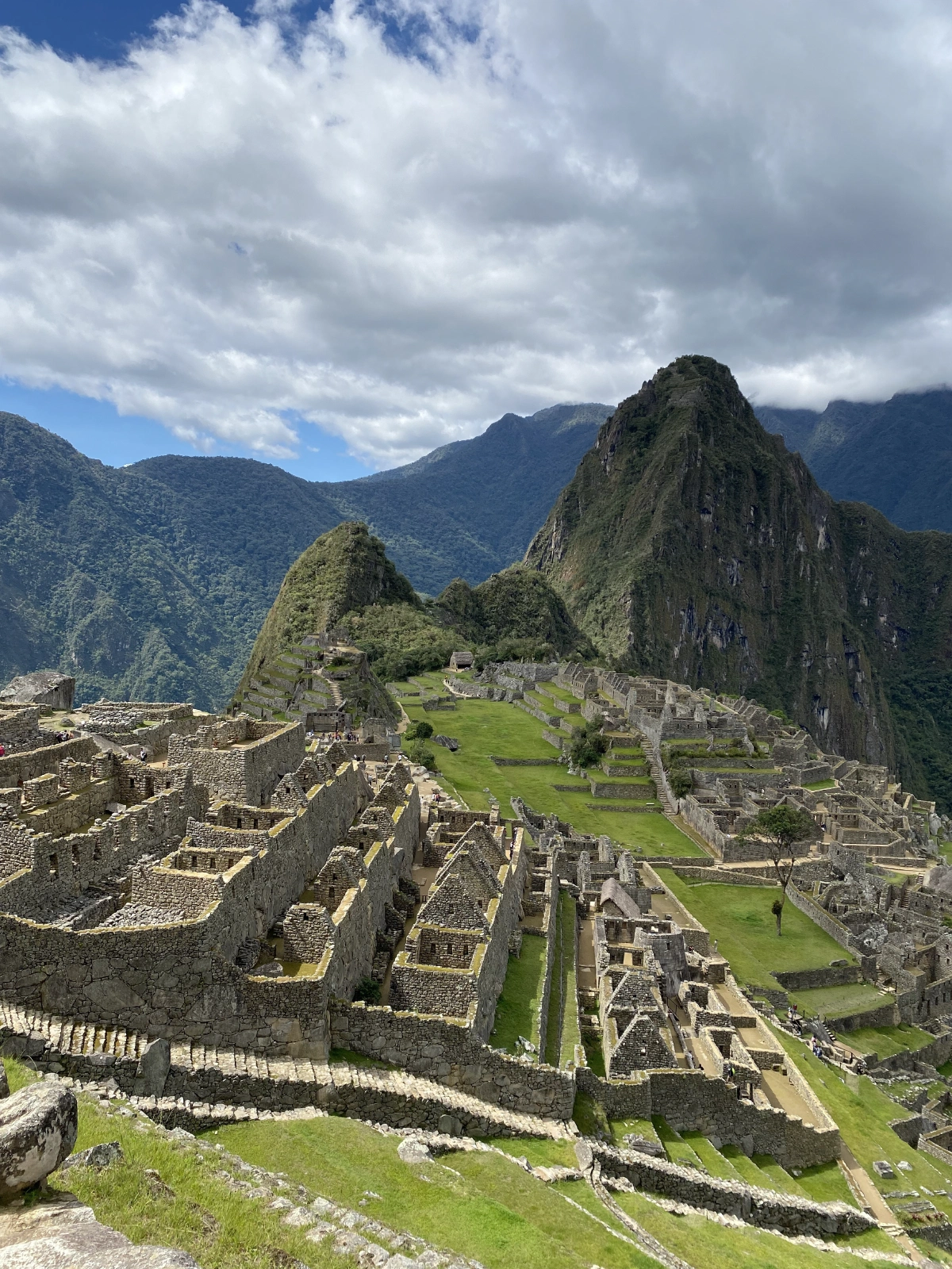 FACTS - the smaller mountain here is called the *Huayna Picchu*, or *young mountain* and the bigger moutain is called *Machu Picchu* or *old mountain*